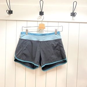 Lululemon run shorts, grey with turquoise trim, size 4